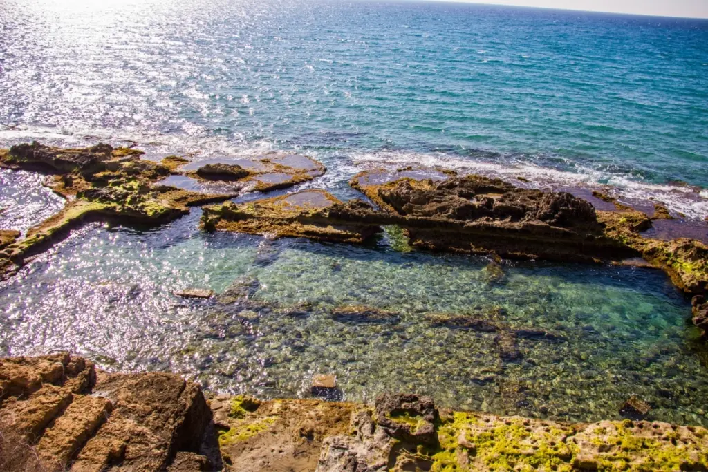 Rock pools at Baños de la Reina beside the Mediterranean Sea in Calpe