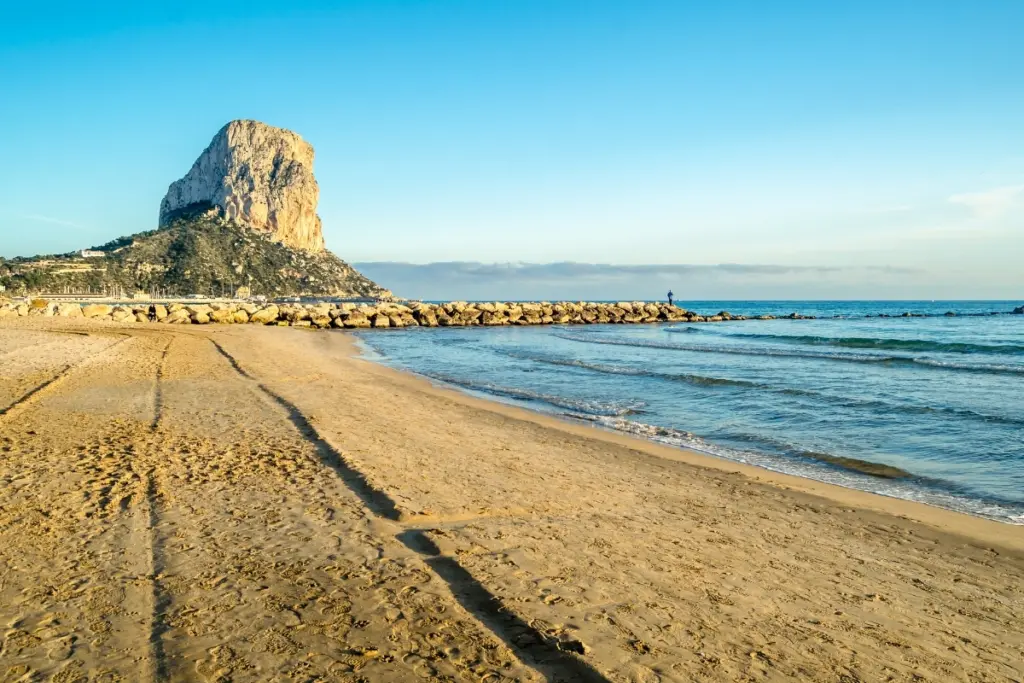 Arenal-Bol Beach in Calpe with the Peñón de Ifach and calm sea in summer