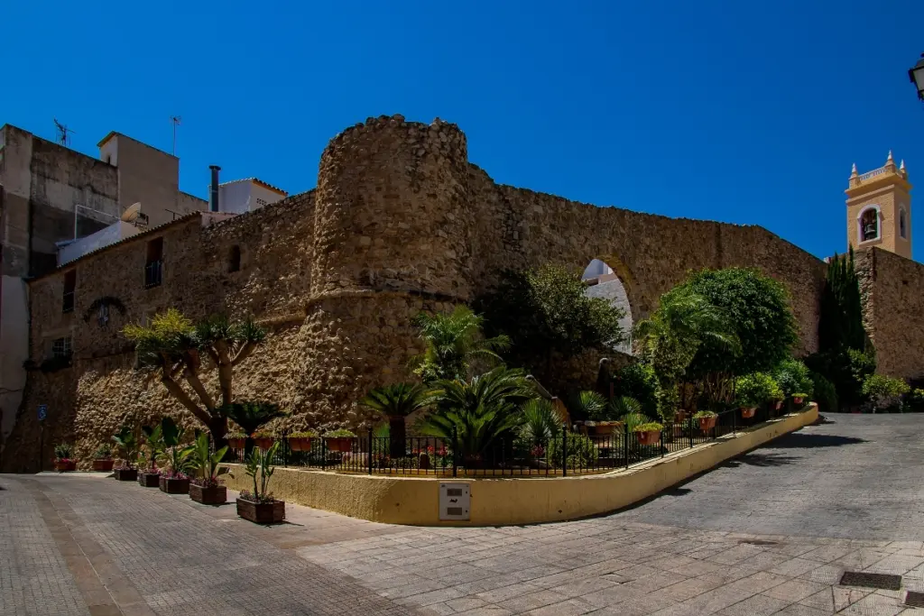 Torreó de la Peça and the surviving old town walls in Calpe, Spain