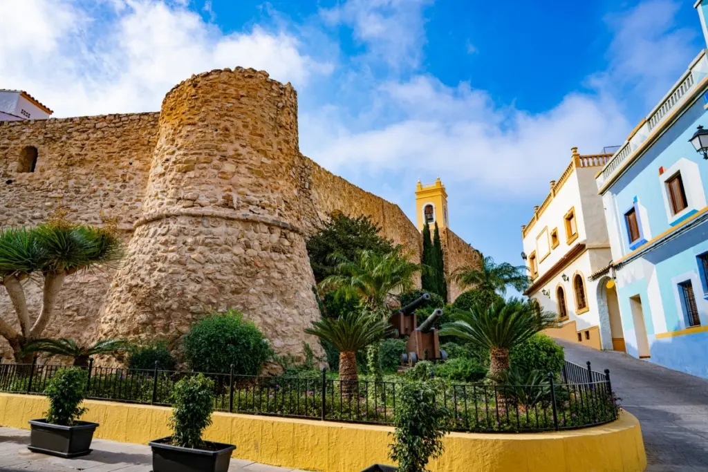 Torreó de la Peça, historic walls and old town buildings in Calpe, Spain